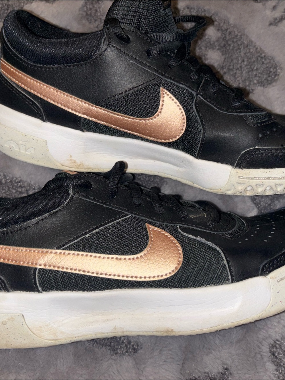 Nike Women’s Black Sneakers with Rose Gold Swoosh